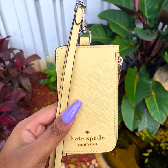 kate spade Accessories - Kate Spade Staci Card Case Lanyard in Butter